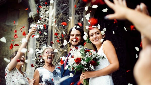 family-throwing-rose-petals-at-the-newly-wed-bride-2023-11-27-05-05-36-utc